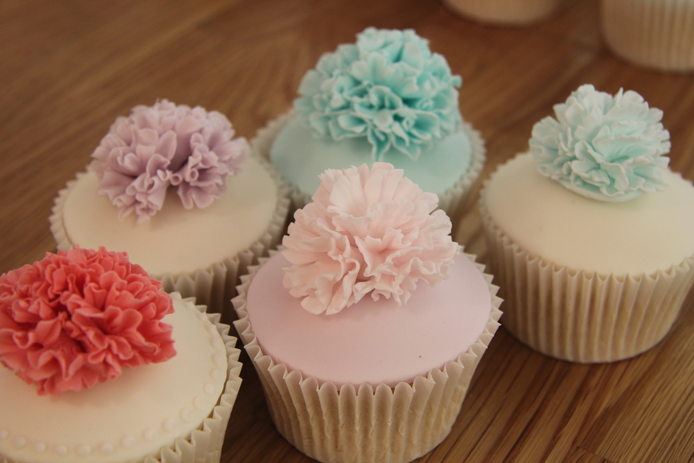 Multi-coloured cupcake icing